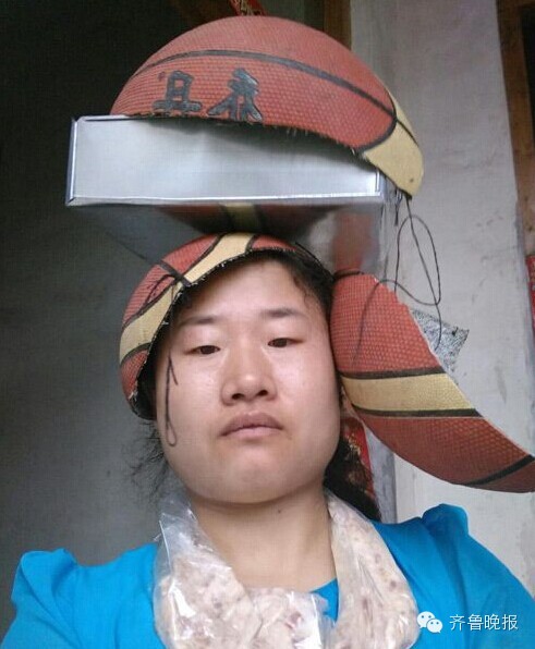 泰安"仙女"设计师王守英"创作"无边界,头顶篮球致敬世界杯